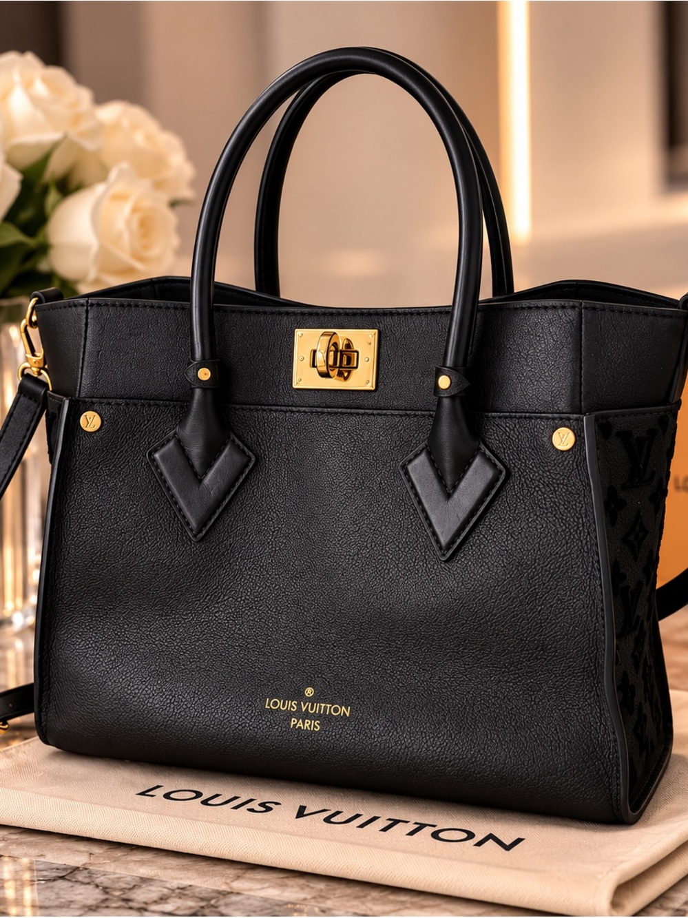 Louis Vuitton Black Leather Satchel with Gold Hardware